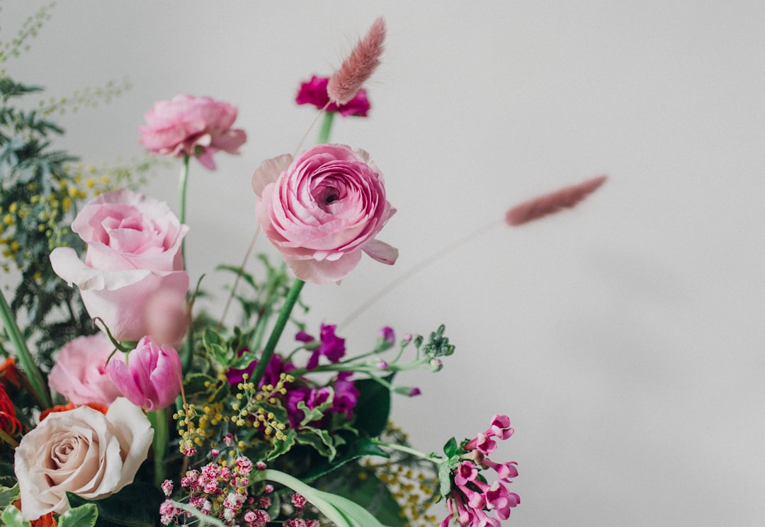 Empowerment in Ink: Unique Tattoos for Girls with a delicate rose and arrow design.